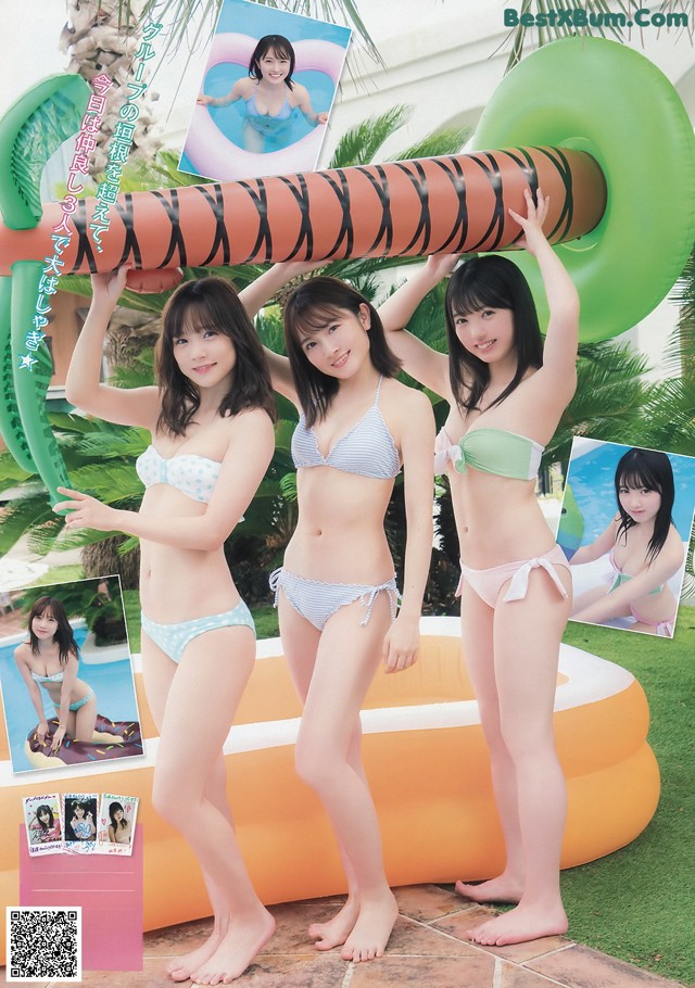 A group of three women in bikinis standing next to each other.