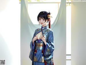 A woman in a kimono sitting under a tree with flowers.