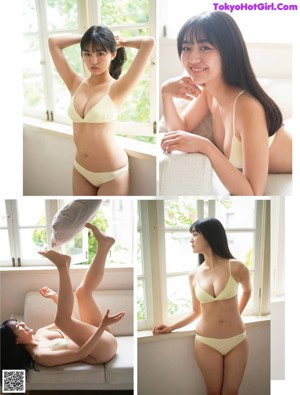 A woman in a white bikini standing in a kitchen.