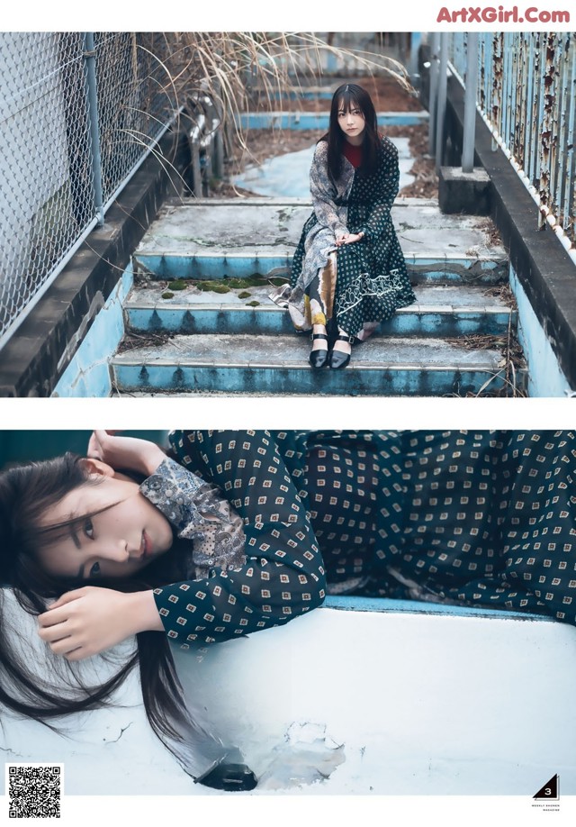 A woman sitting on the steps of an abandoned building.