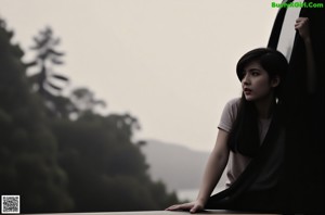 A woman in a white shirt and red tie sitting on a bench.